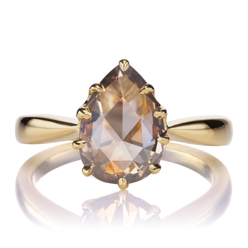 Fancy Dark Orangey Brown Pear Cut Diamond in Tapered 18kt Gold Setting