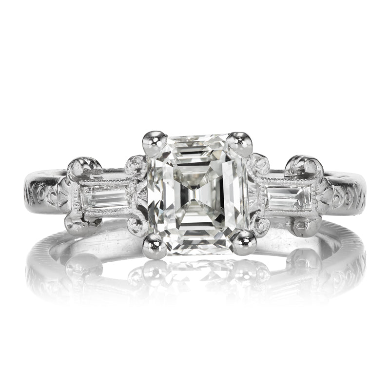 Edwardian Era Antique 1.09 Carat Emerald Cut Diamond Engagement Ring with Scroll Design