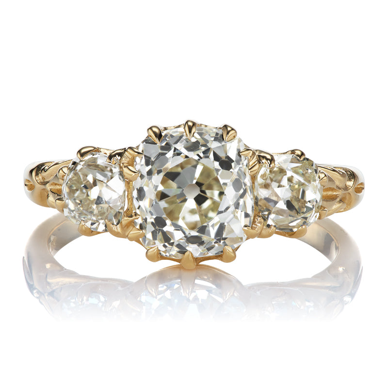 Old Mine Cut Diamond Three Stone Engagement Ring with Detailed Setting
