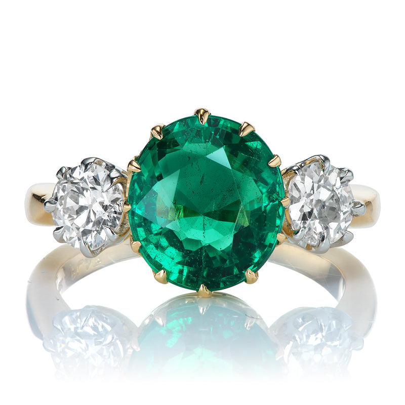 3.23-carat Oval Cut Zambian Emerald Ring with Diamond Side Stones