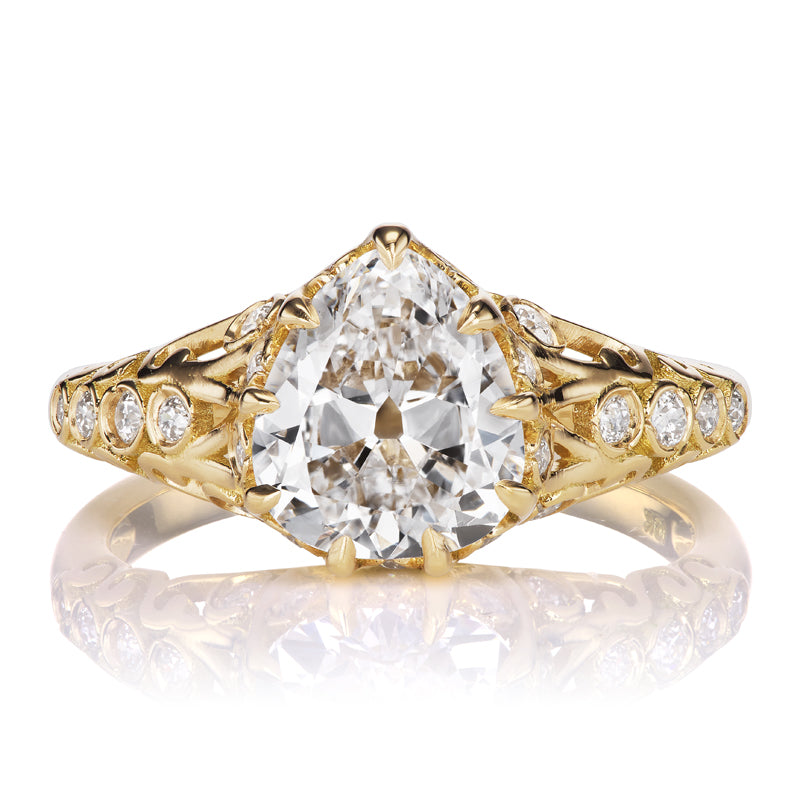 1.83 Carat Pear Cut Diamond in 18kt Yellow Gold with Swirling Filigree and Side Diamonds