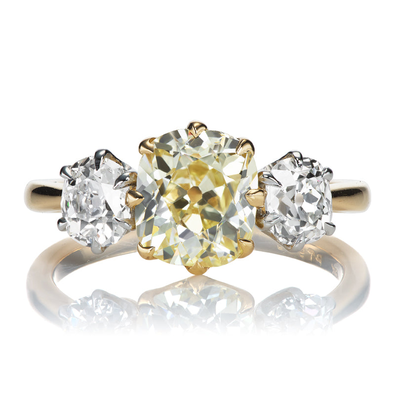 Warm Old Mine Cut Diamond Engagement Ring with Contrasting White Side Stones 