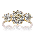 1.89 Carat Warm Colored Old Mine Cut Diamond Three Stone Engagement Ring