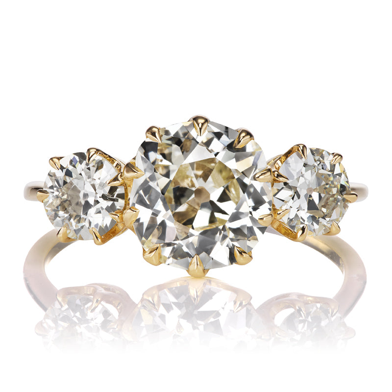 1.89 Carat Warm Colored Old Mine Cut Diamond Three Stone Engagement Ring