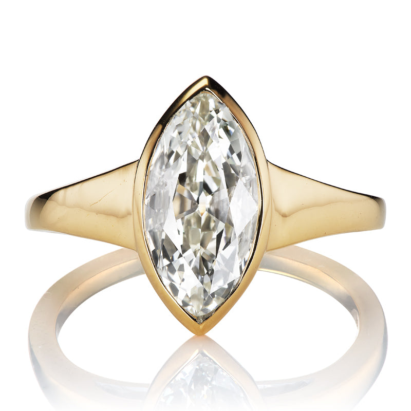 1.5 Carat Marquise Cut Diamond in 18kt Gold Bezel Setting