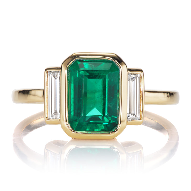 Bright Green Zambian Emerald Ring in 18kt Gold Bezel Setting with Diamond Baguettes