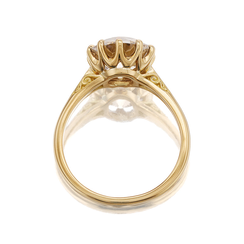 fancy color, si-i clarity diamond in yellow gold setting