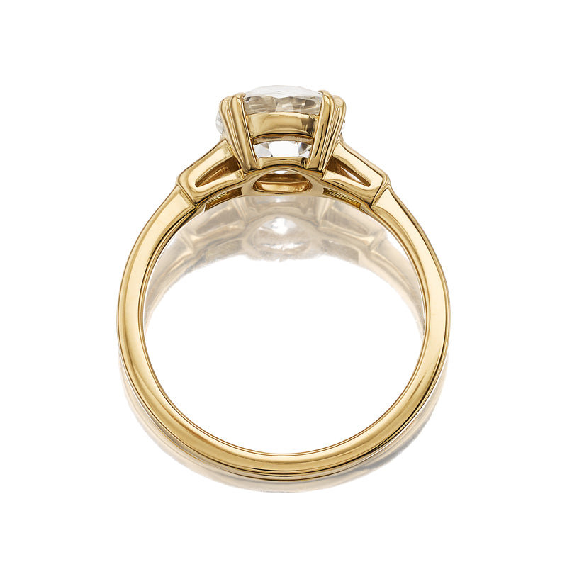 j-k-l color, si-i clarity diamond in yellow gold setting