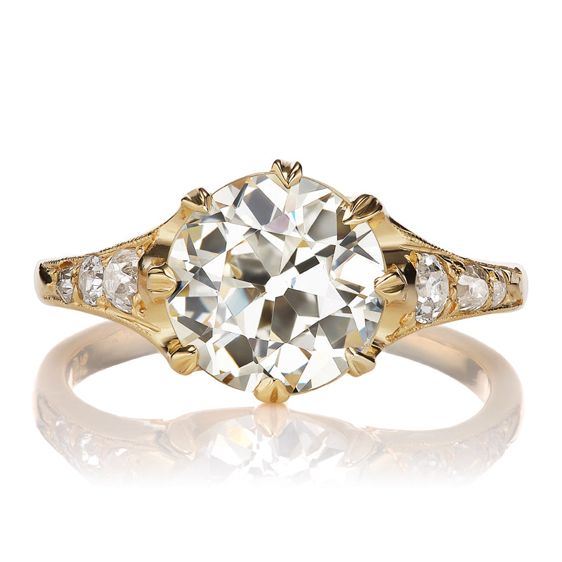 Old Mine Cut Diamond Ring with Tapered Band and Side Stones