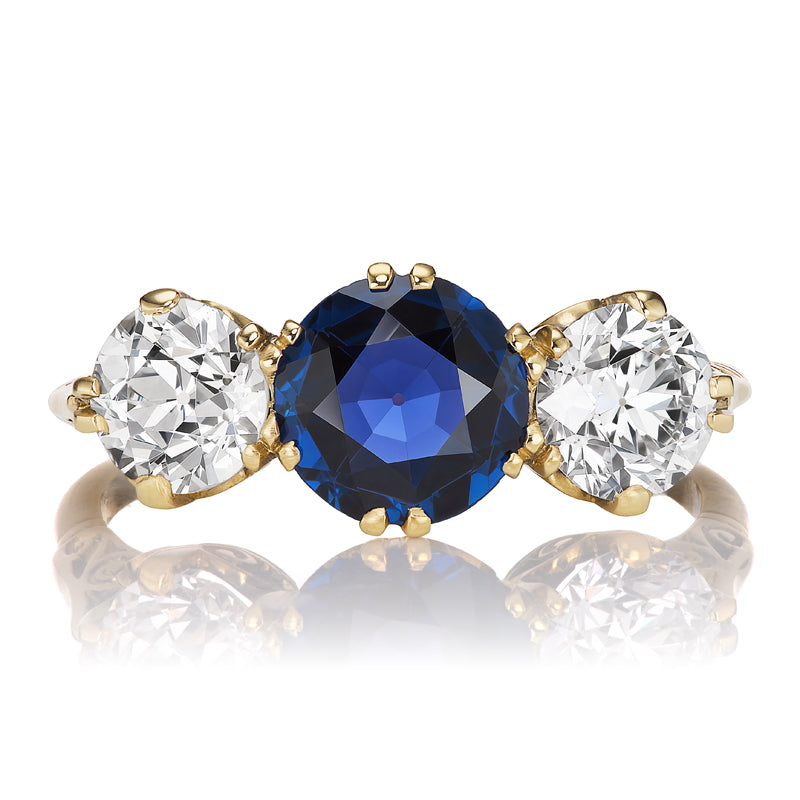 Whimsical Antique Three-Stone Sapphire and Diamond Ring