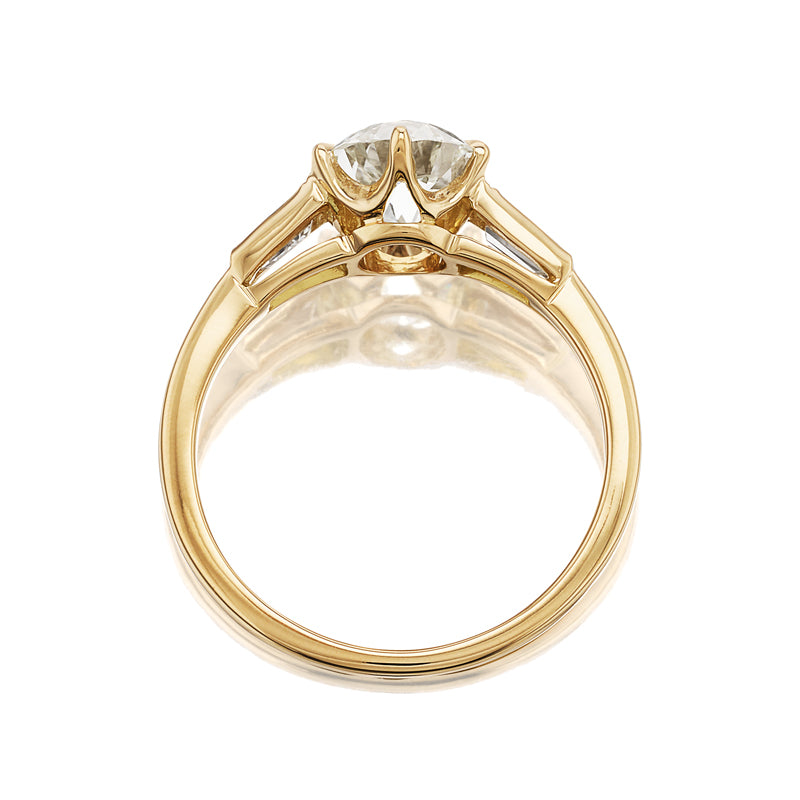 j-k-l color, si-i clarity diamond in yellow gold setting
