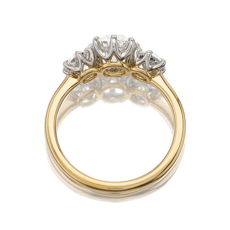 g-h-i color, si-i clarity diamond in two-tone setting