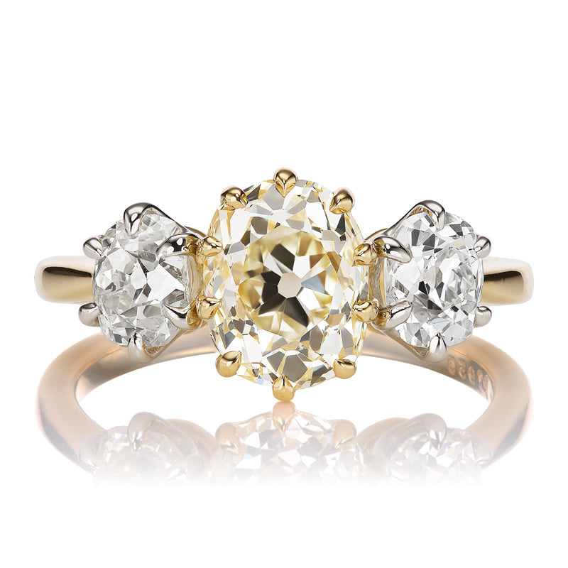 Warm Elongated Old Mine Cut Diamond Three-Stone Ring in 18kt Gold