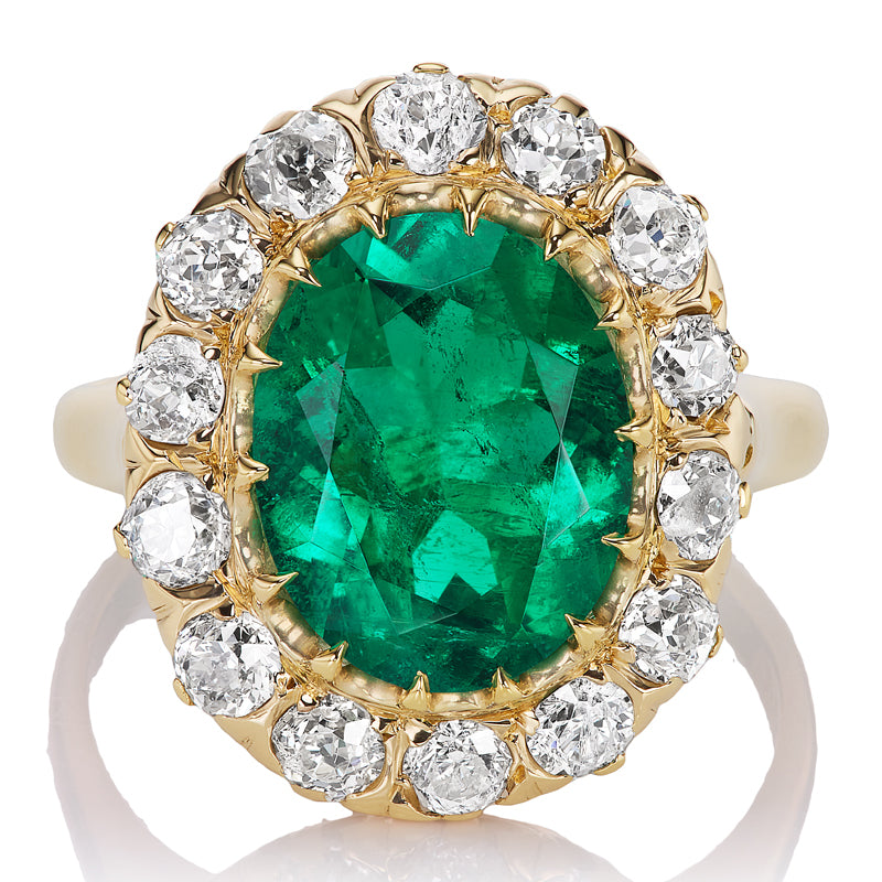 Antique 3 Carat Oval Cut Colombian Emerald and Diamond Cluster Ring