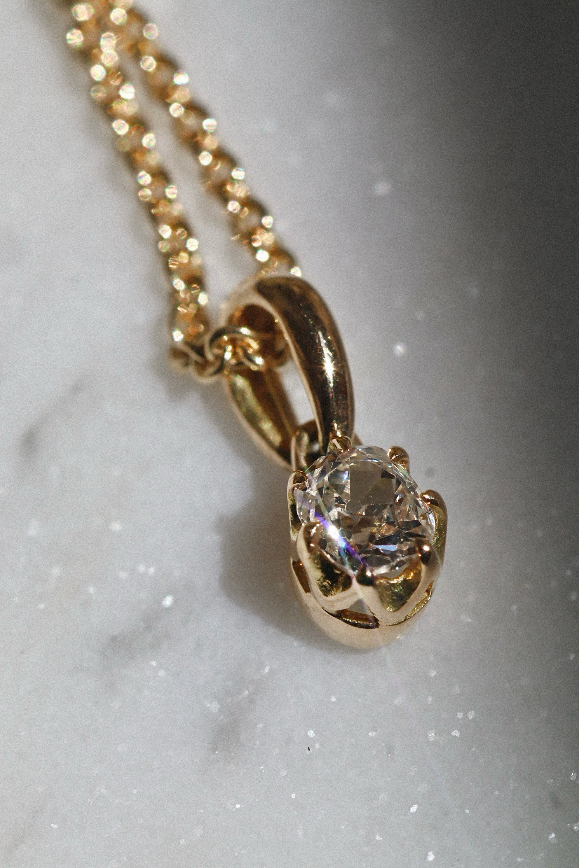 j-k-l color, vs clarity diamond in yellow gold setting