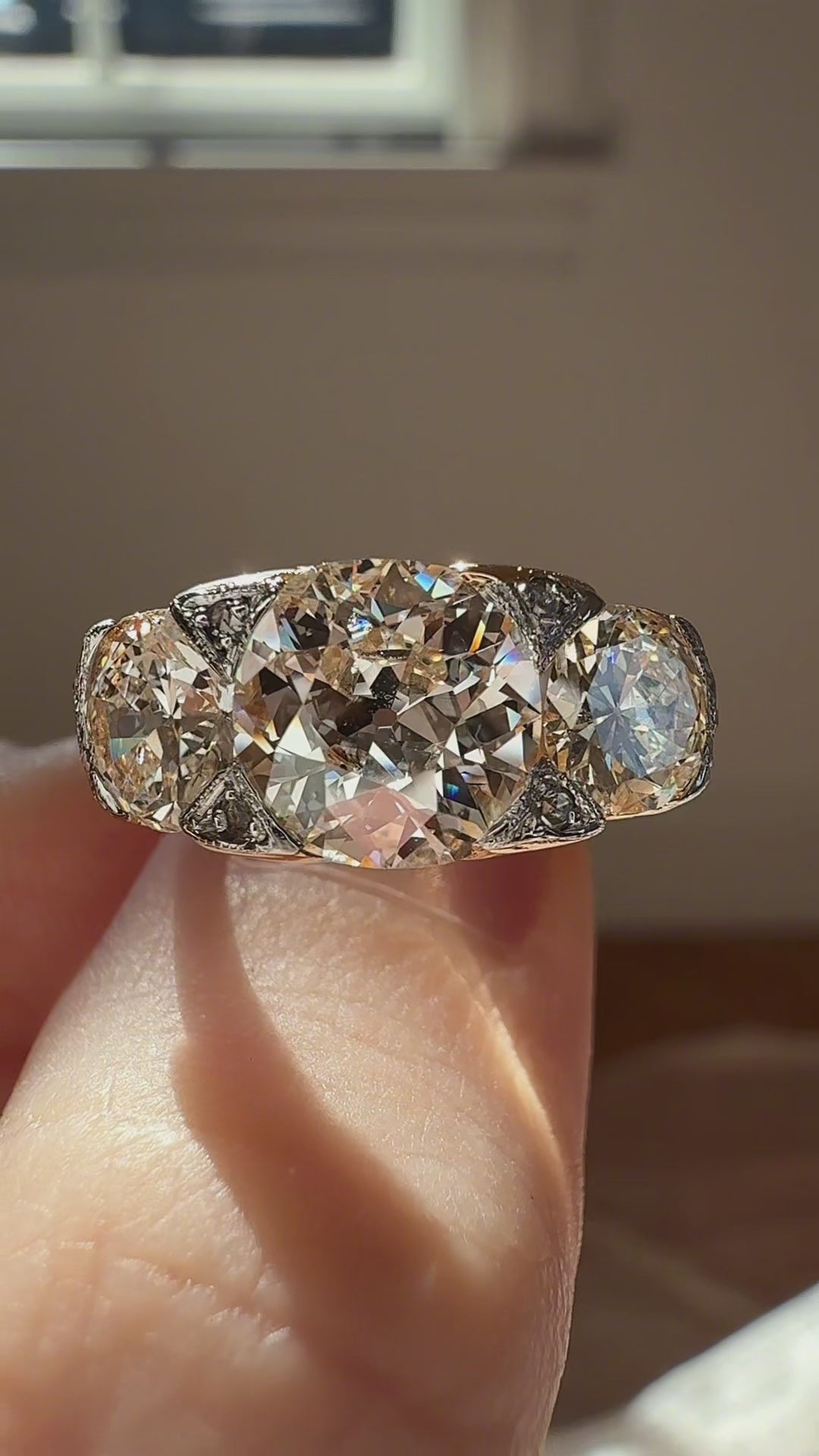 Three-stone Old Mine cut diamond Rings