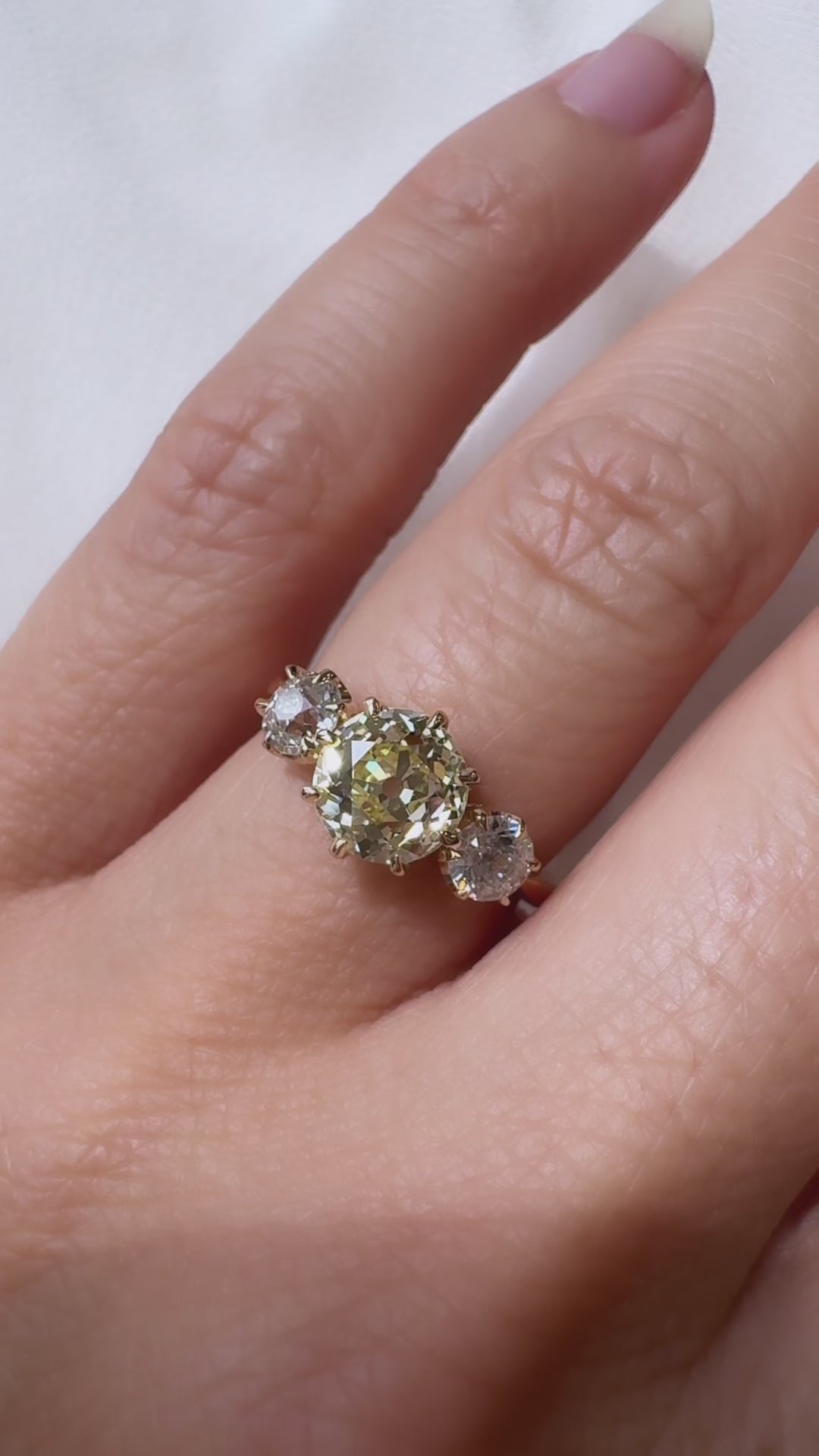 fancy color, vs clarity diamond in yellow gold setting