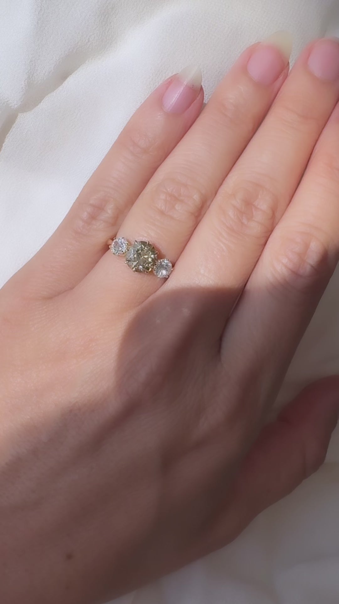 fancy color, si-i clarity diamond in yellow gold setting