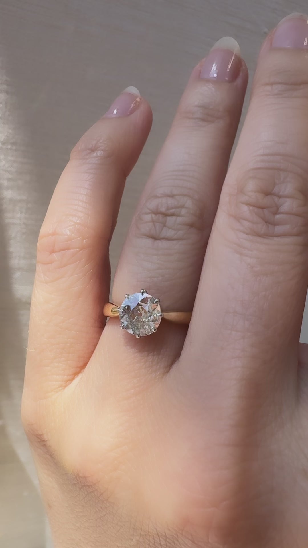 j-k-l color, si-i clarity diamond in yellow gold setting