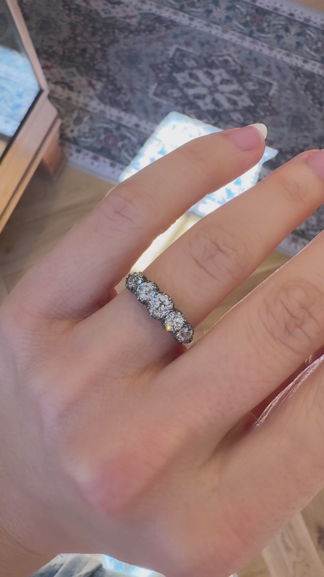 g-h-i color, si-i clarity diamond in two-tone setting