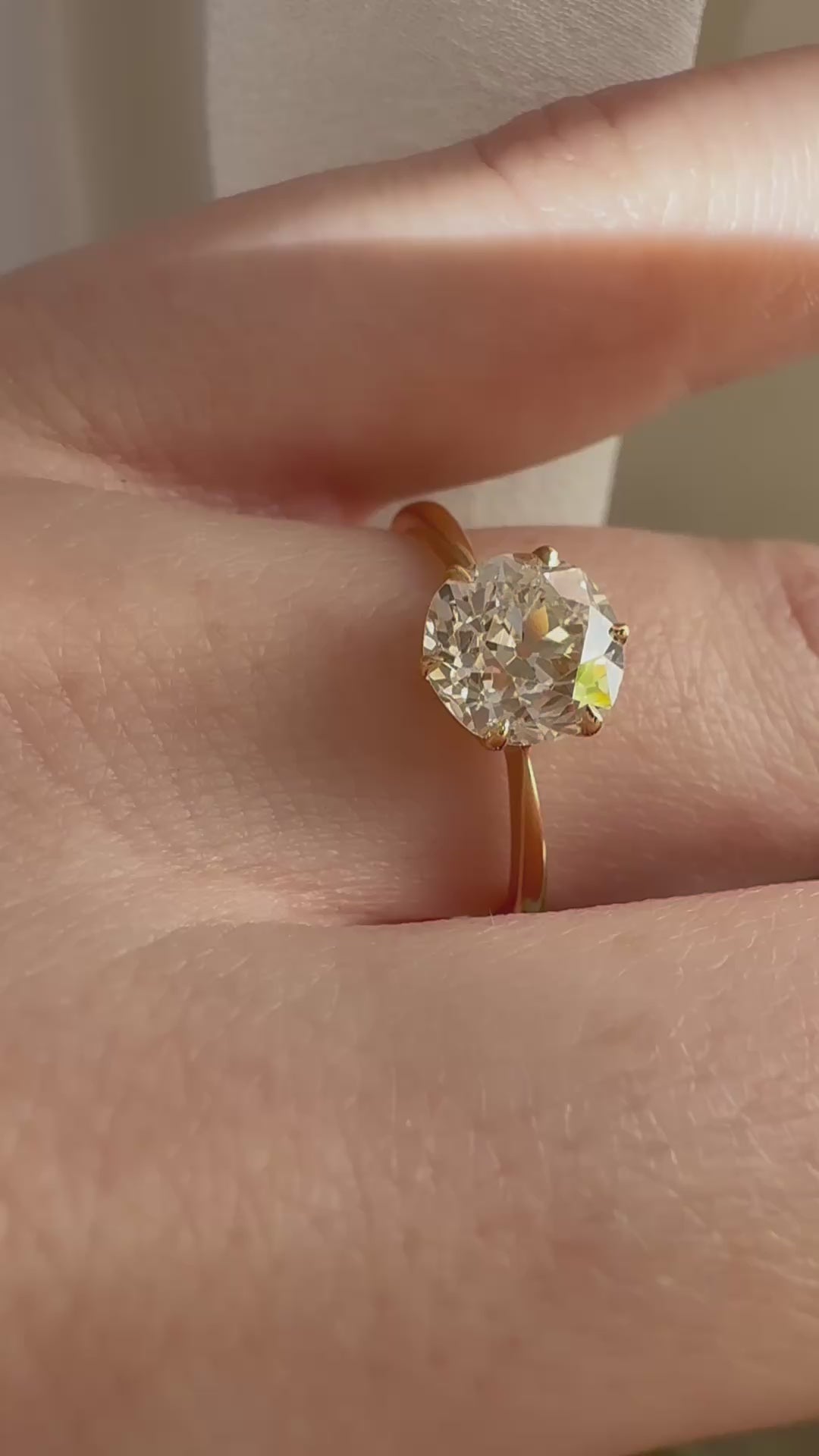 j-k-l color, si-i clarity diamond in yellow gold setting