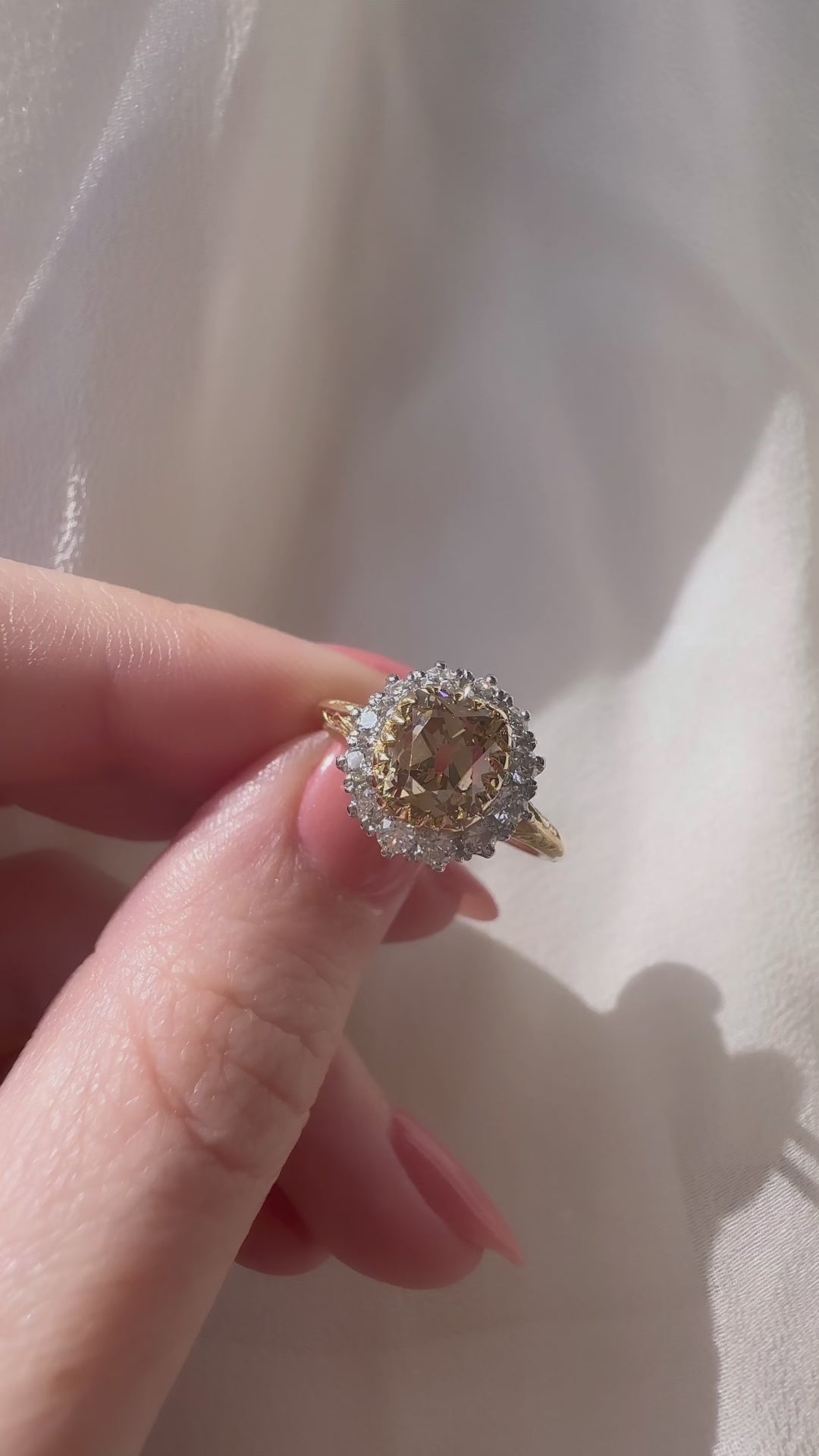 fancy color, si-i clarity diamond in two-tone setting