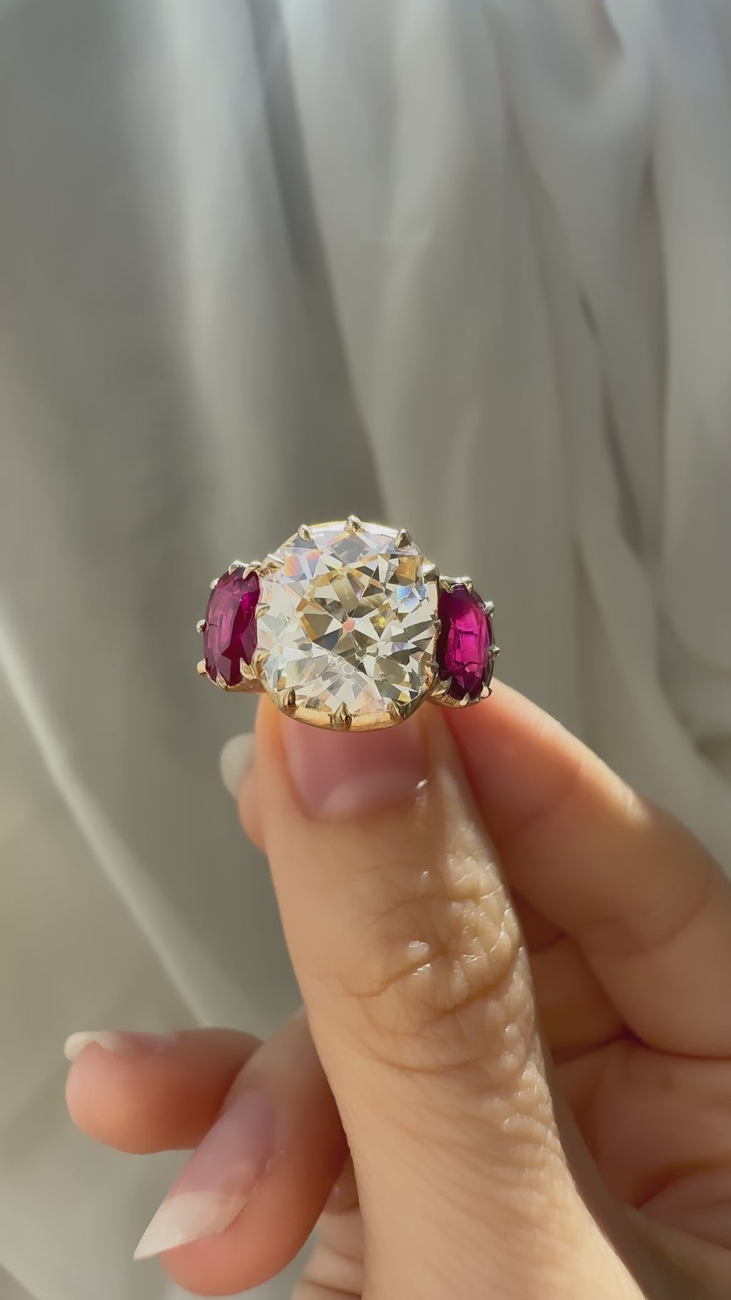 Diamond engagement orders ring with ruby side stones