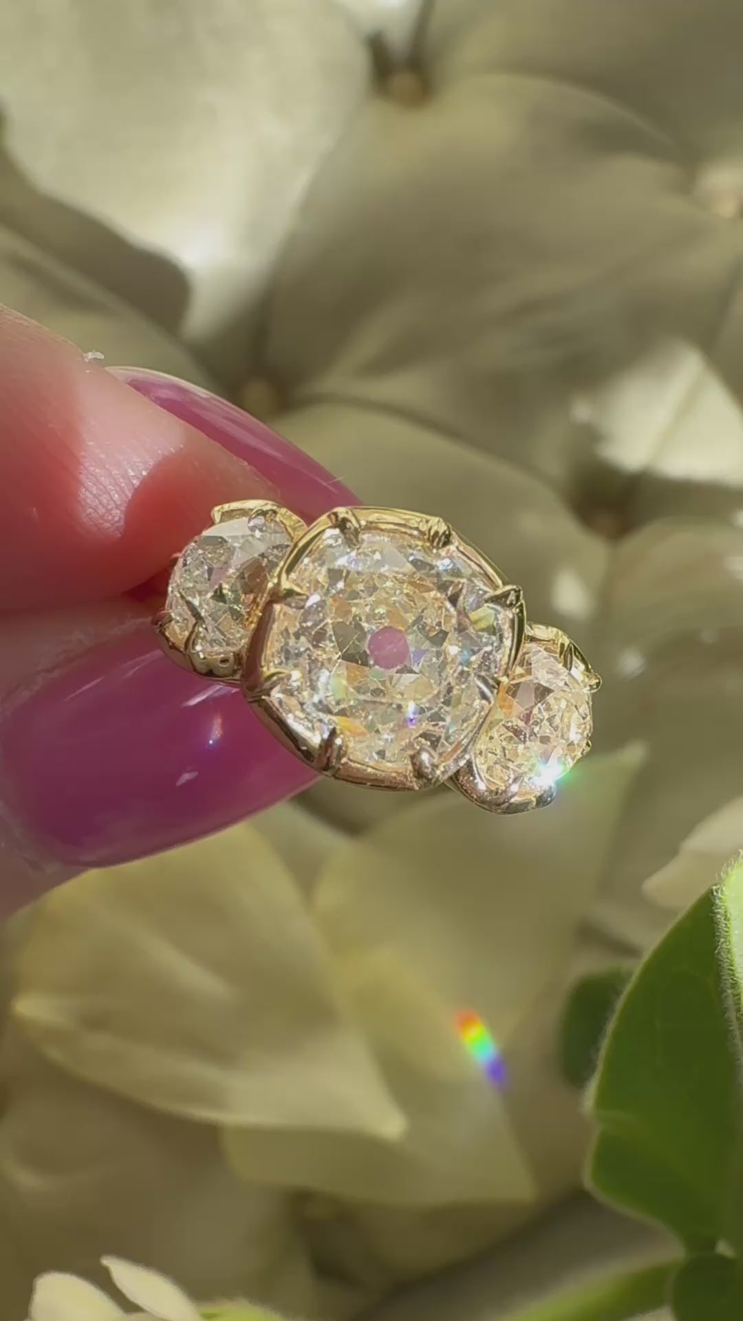 Three-stone Old Mine cut diamond Rings