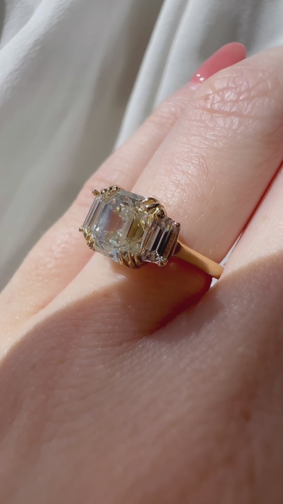 Three-stone Step  cut diamond Rings