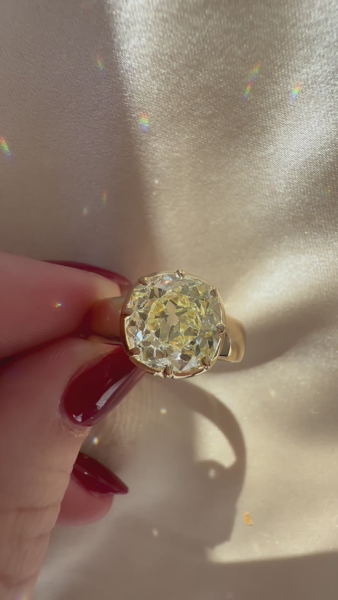 m-z color, si-i clarity diamond in yellow gold setting