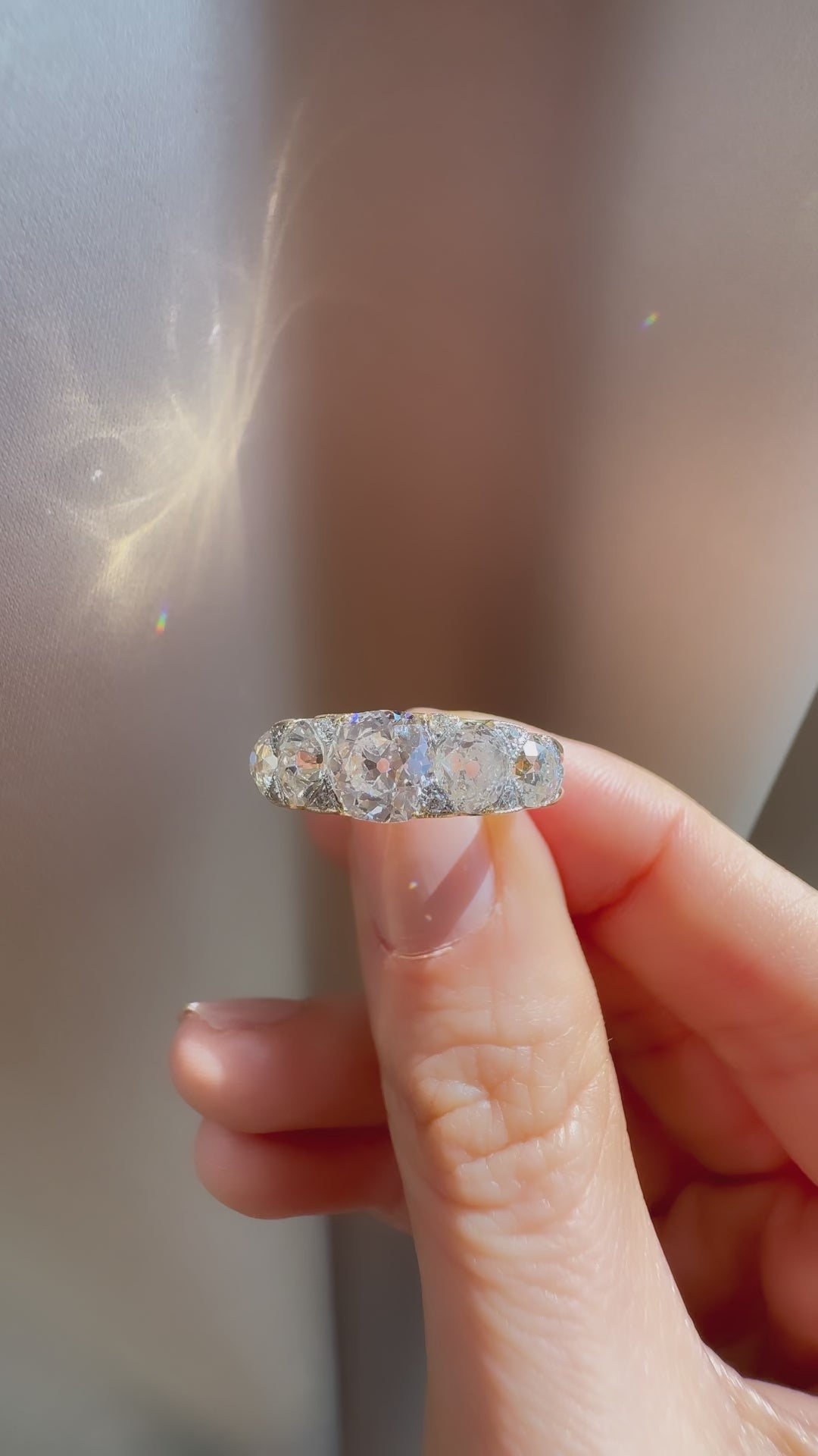 g-h-i color, si-i clarity diamond in two-tone setting