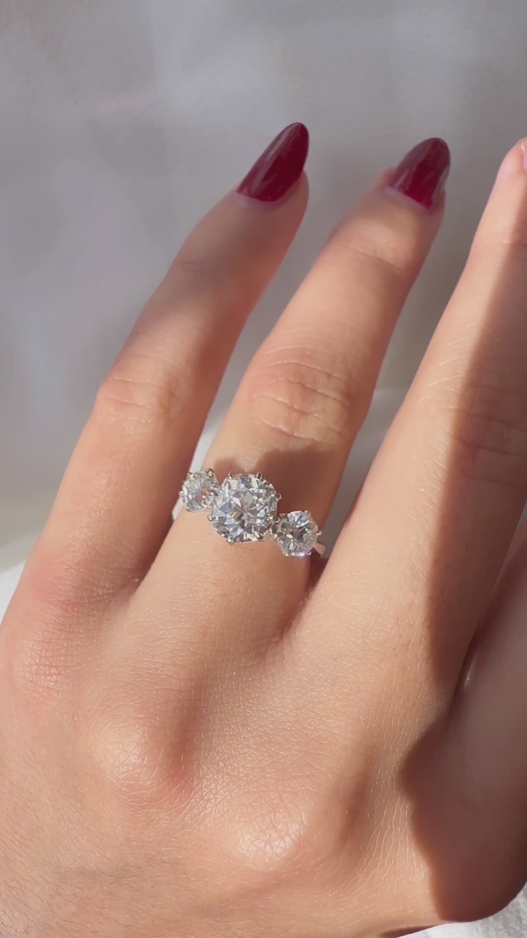 Three-stone Old Mine cut diamond Rings