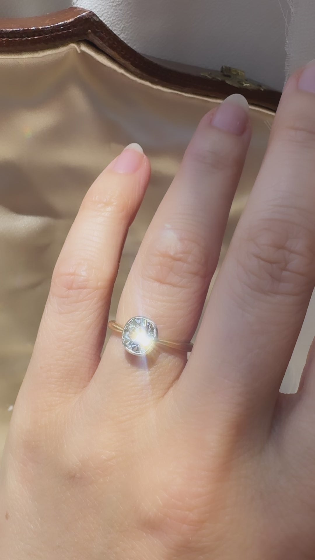 j-k-l color, vs clarity diamond in two-tone setting