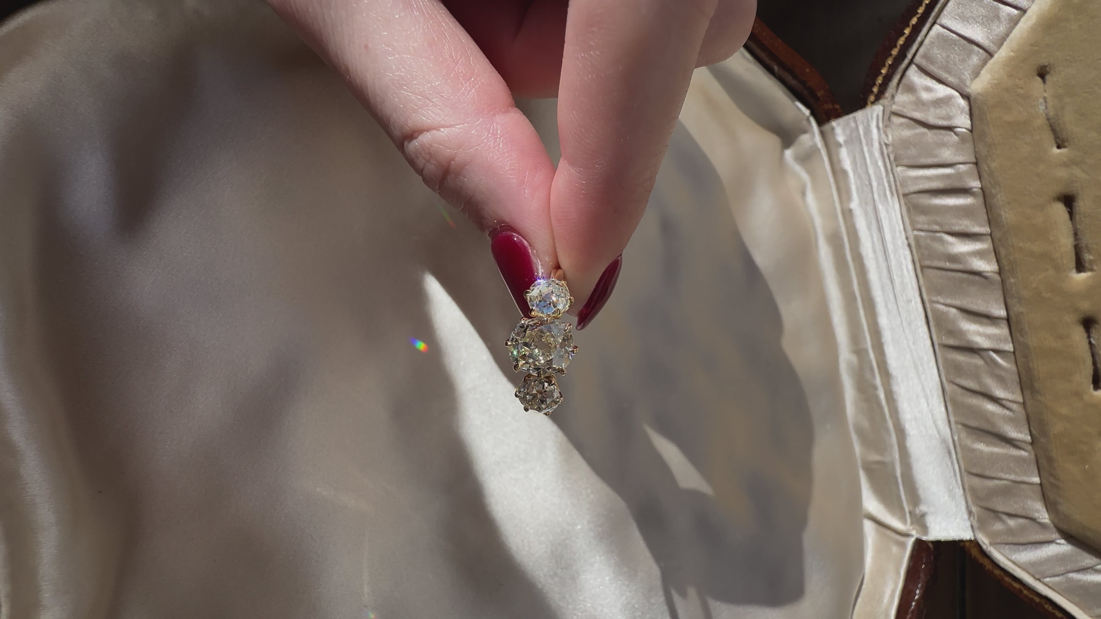 Three-stone Old Mine cut diamond Rings