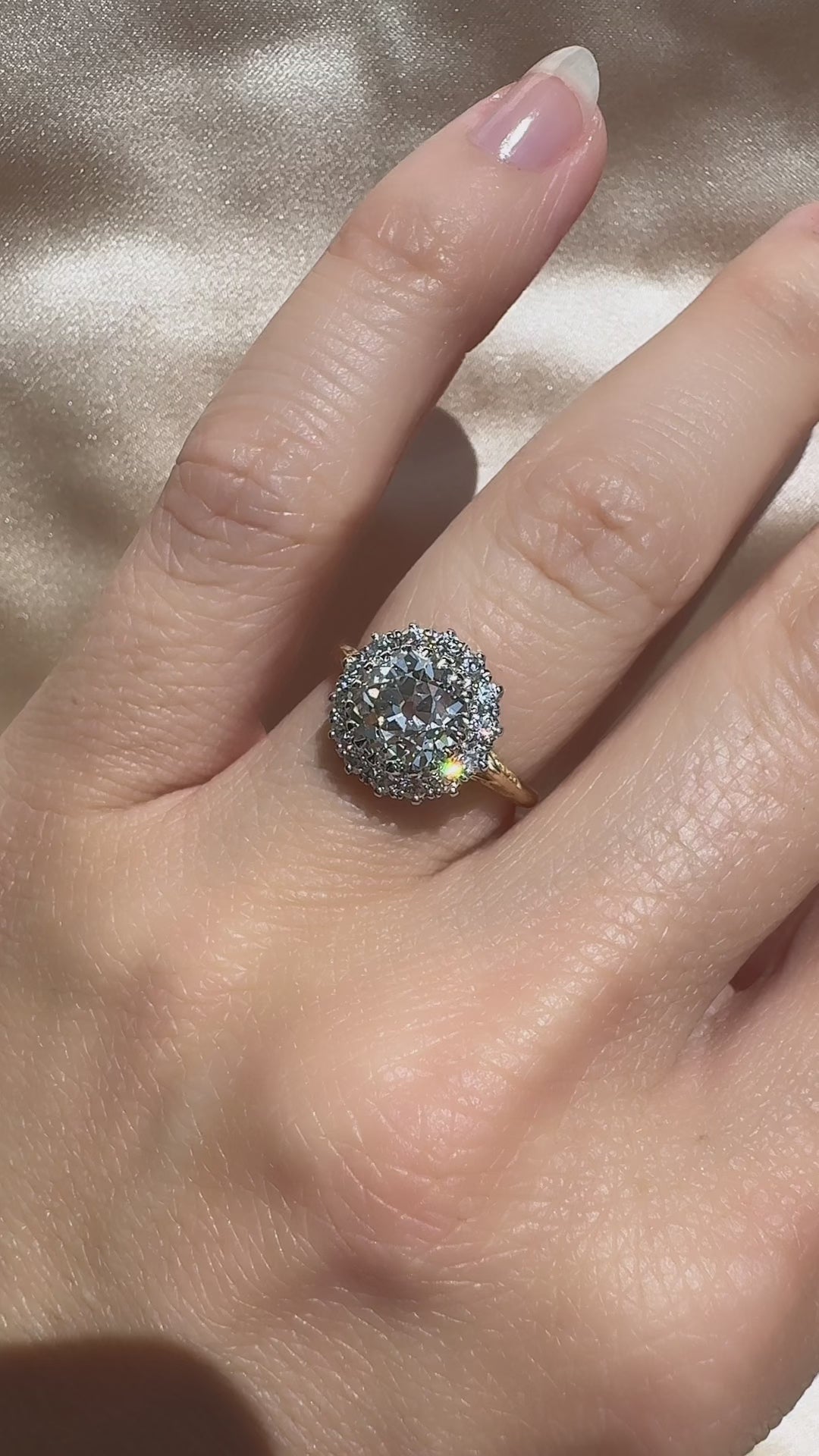 j-k-l color, vs clarity diamond in two-tone setting