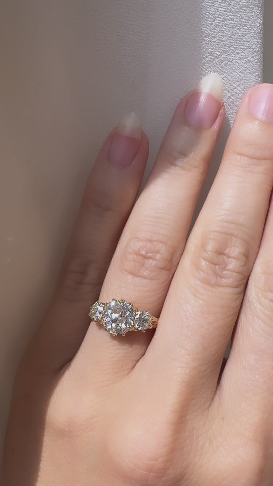 Three-stone Old Mine cut diamond Rings