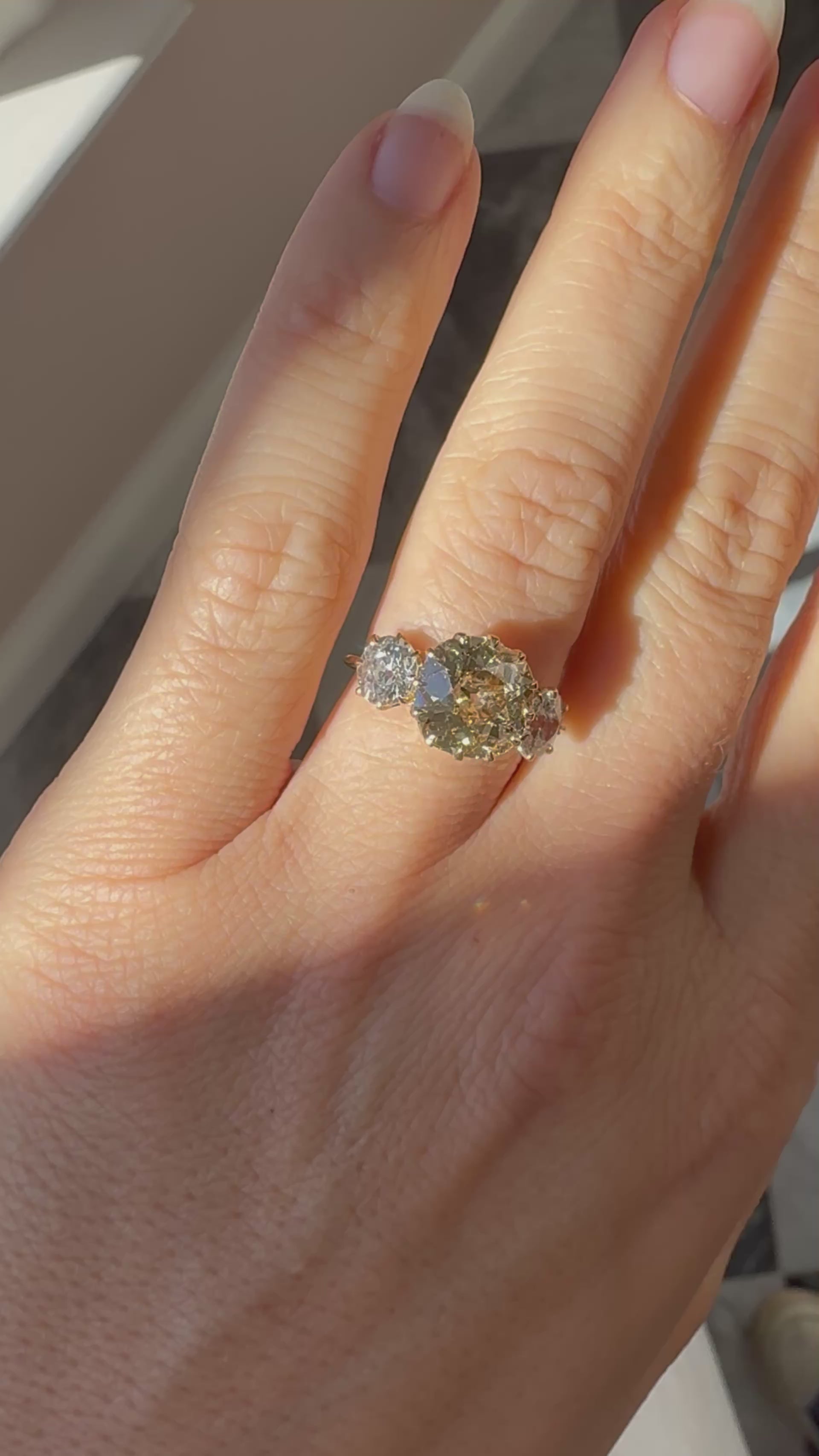 fancy color, si-i clarity diamond in yellow gold setting