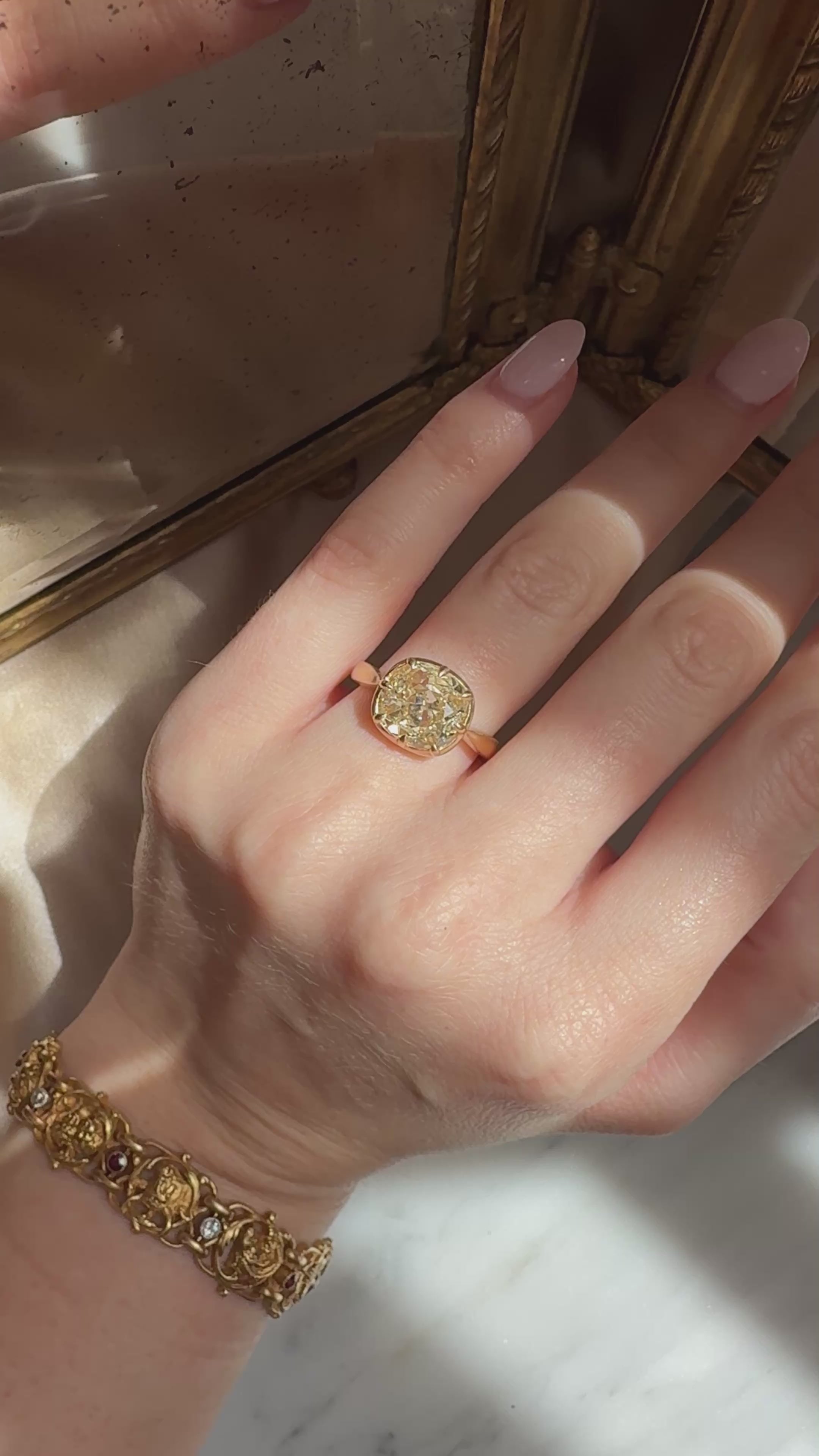 j-k-l color, si-i clarity diamond in yellow gold setting