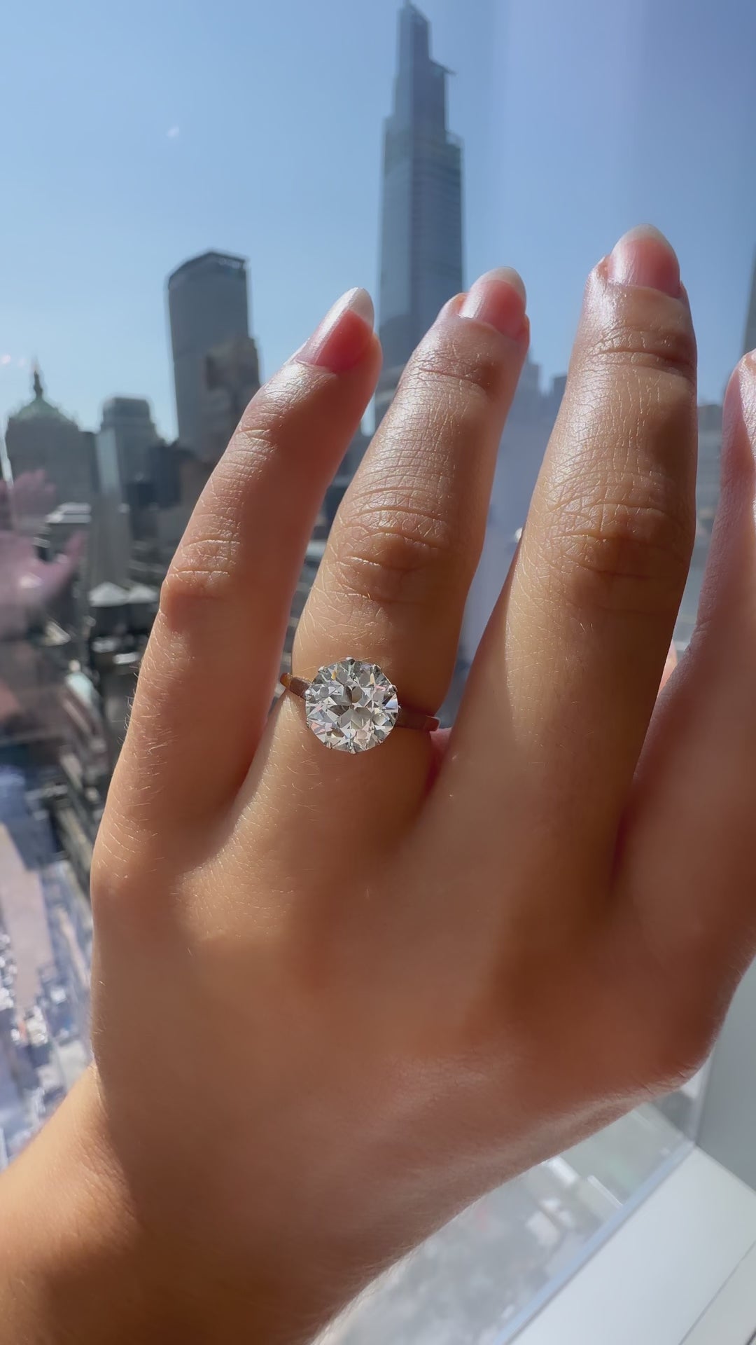 j-k-l color, vs clarity diamond in two-tone setting