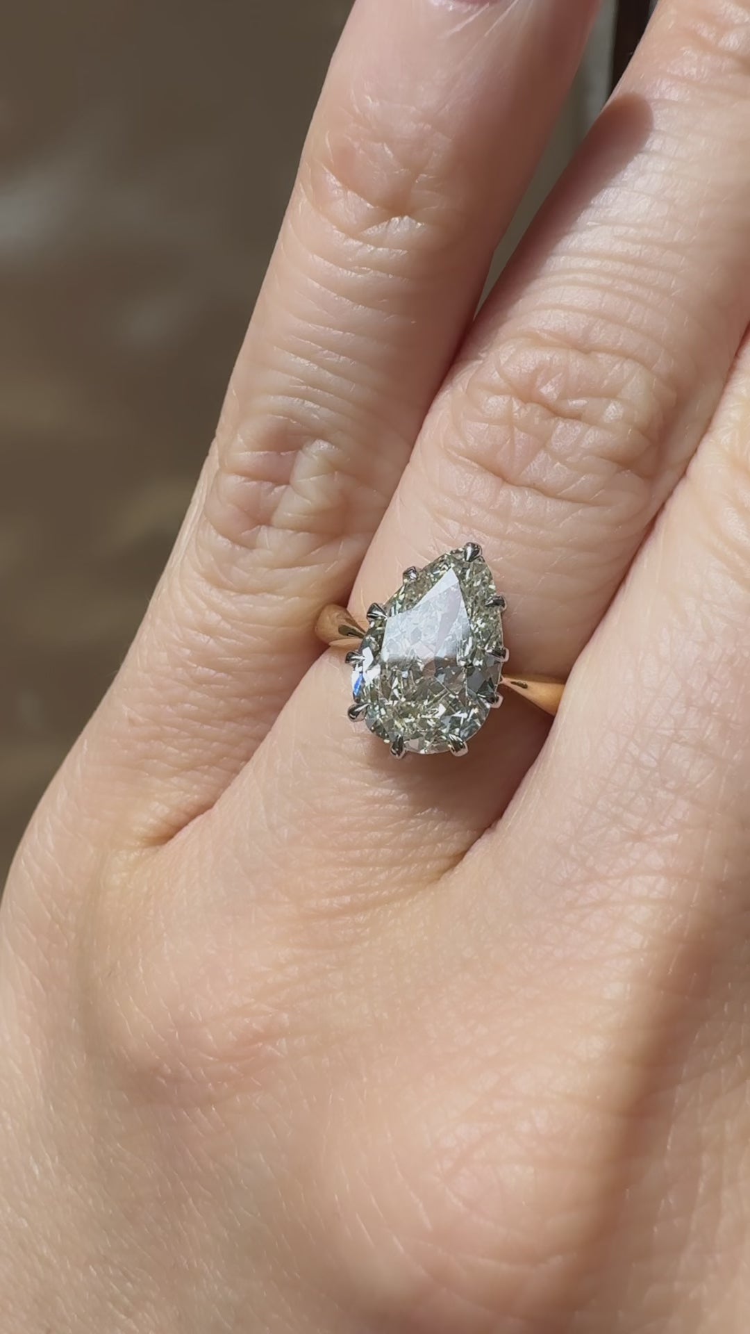 j-k-l color, vs clarity diamond in two-tone setting