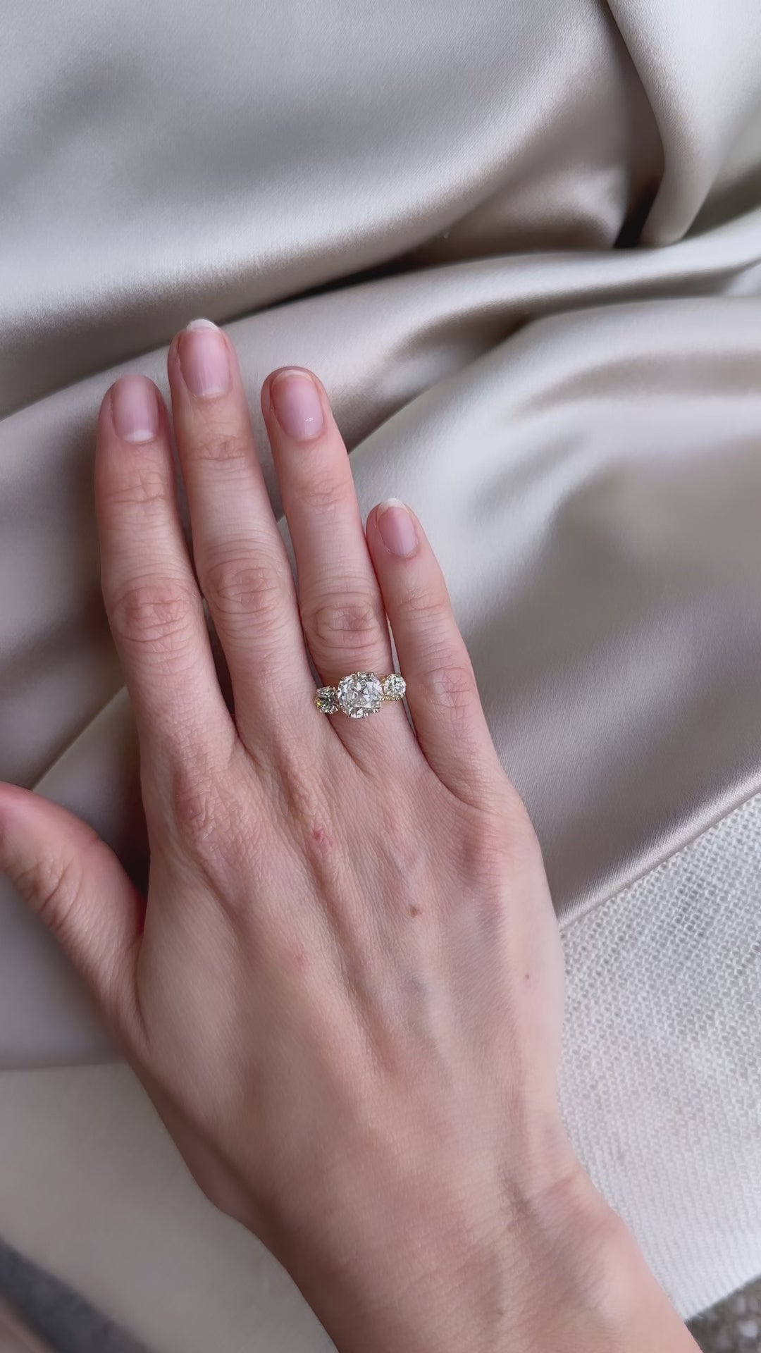 j-k-l color, si-i clarity diamond in yellow gold setting