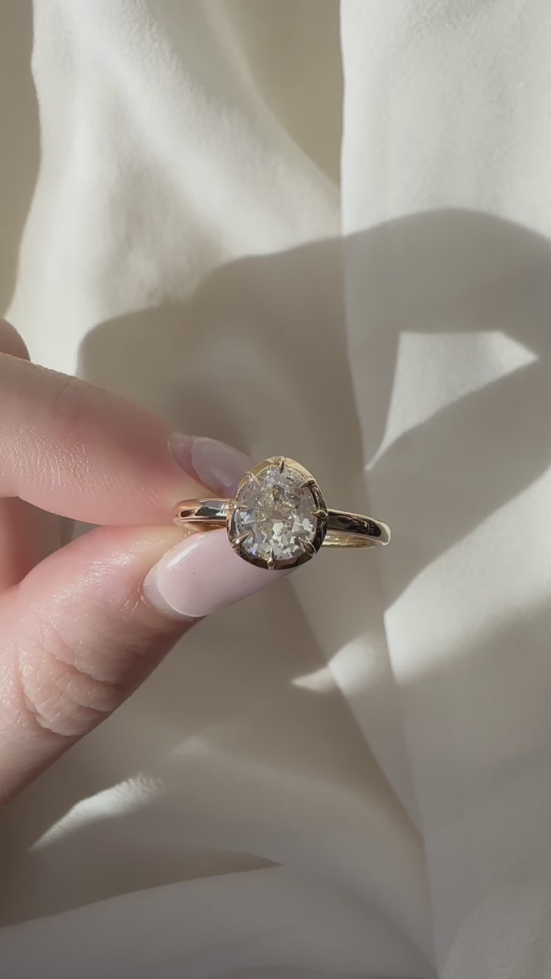 j-k-l color, si-i clarity diamond in yellow gold setting