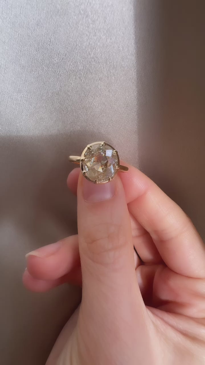 j-k-l color, si-i clarity diamond in yellow gold setting