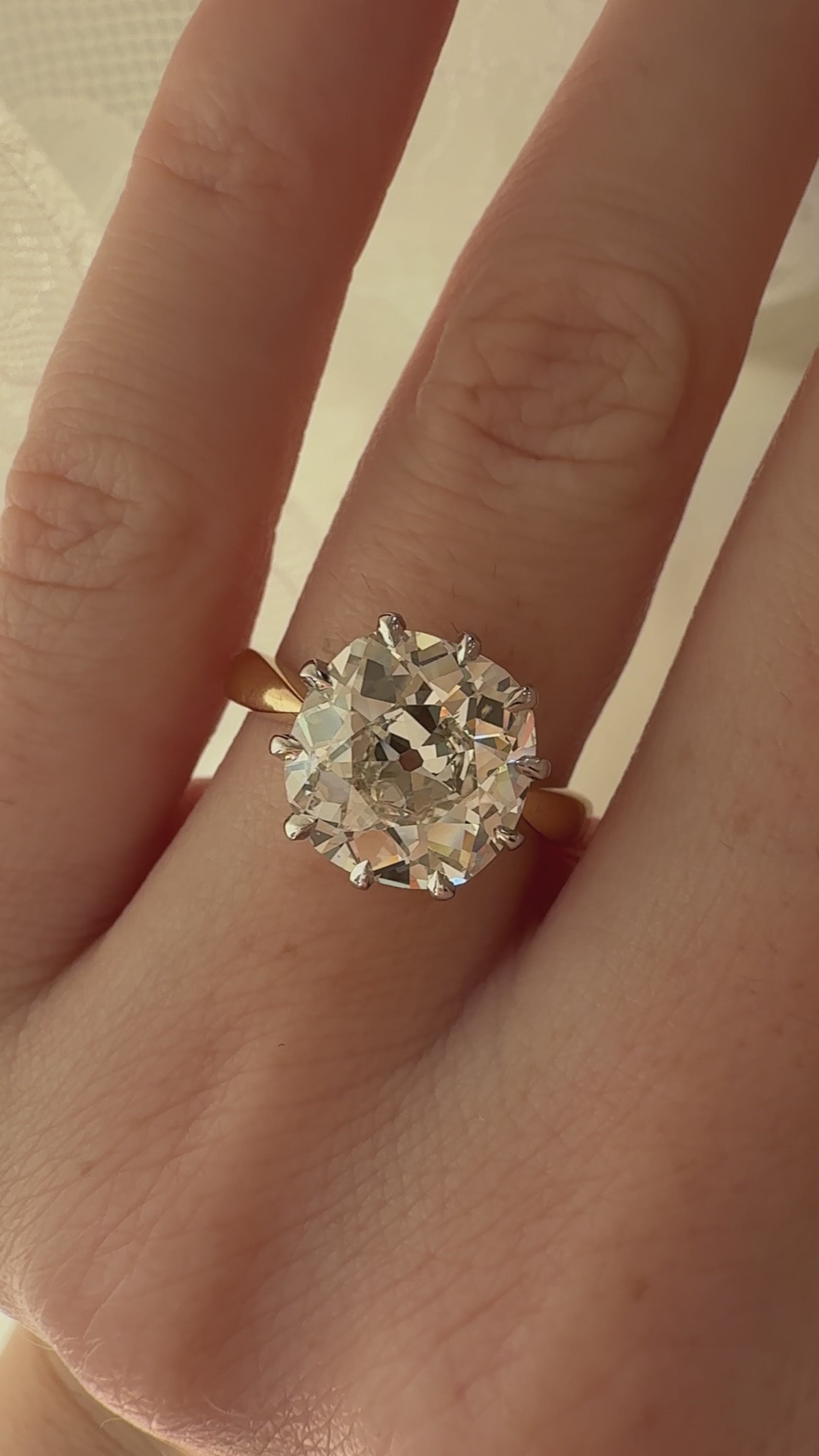 j-k-l color, vs clarity diamond in two-tone setting
