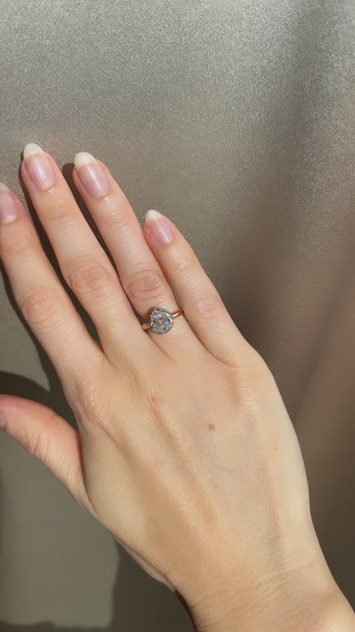 g-h-i color, si-i clarity diamond in two-tone setting