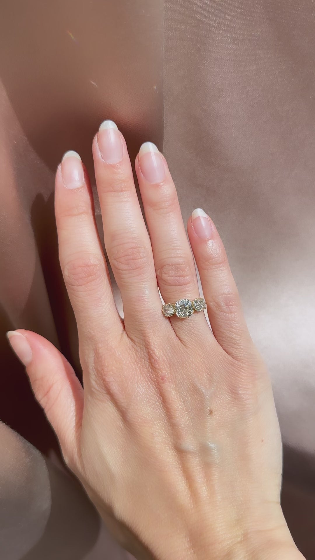 m-z color, si-i clarity diamond in yellow gold setting