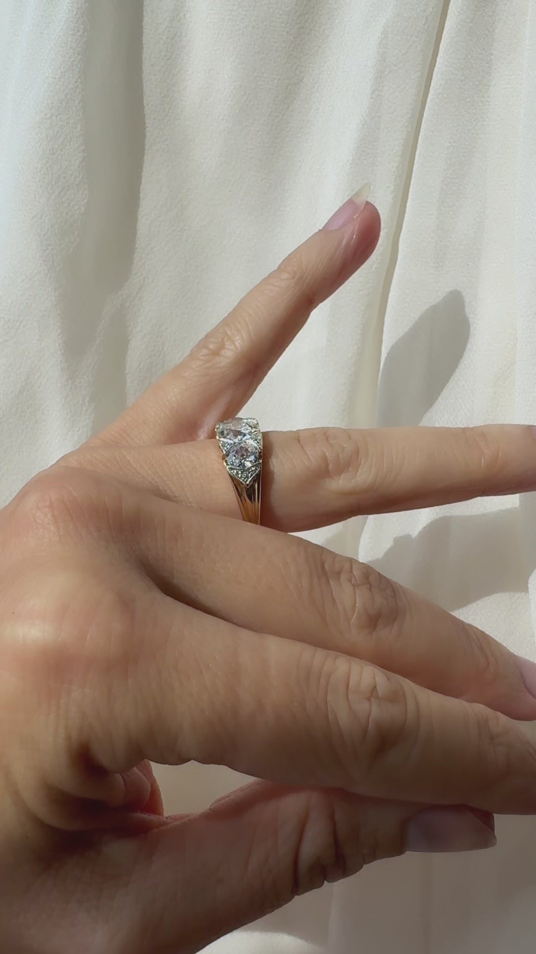 Three-stone Old Mine cut diamond Rings