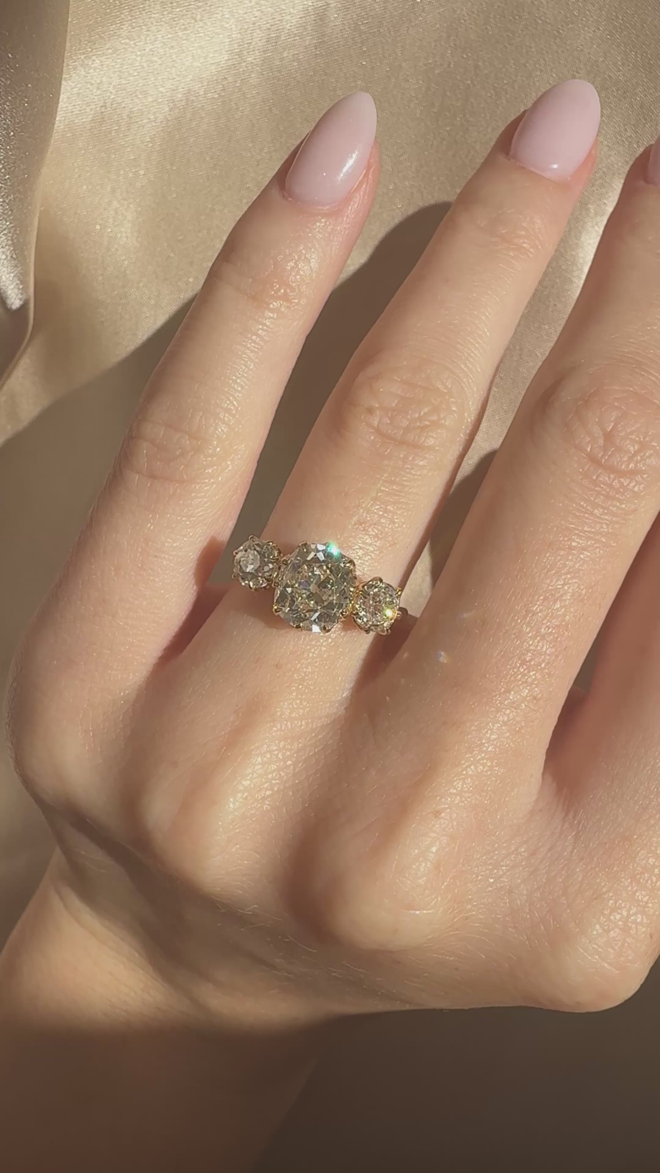 m-z color, si-i clarity diamond in yellow gold setting