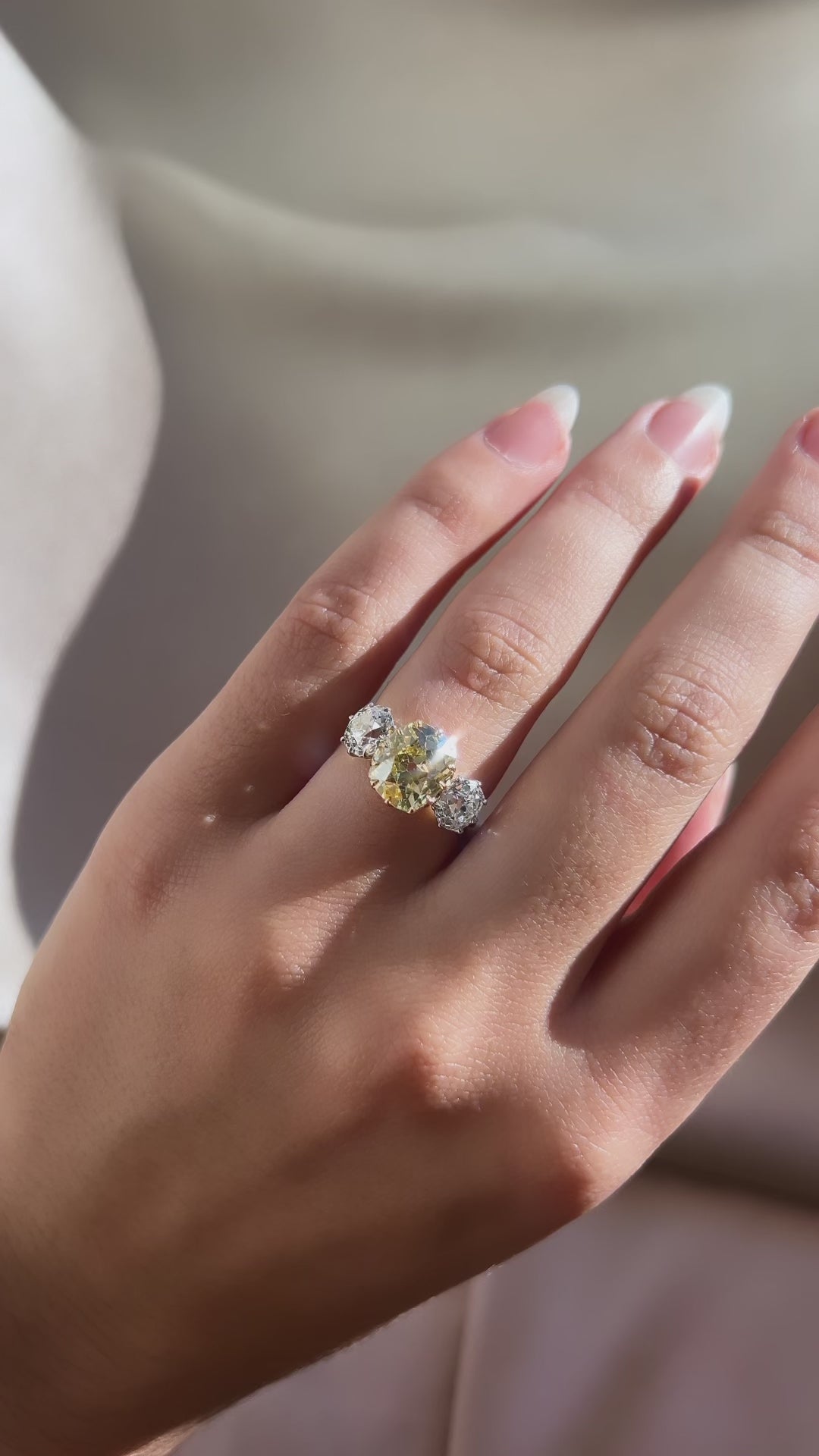 fancy color, vs clarity diamond in two-tone setting