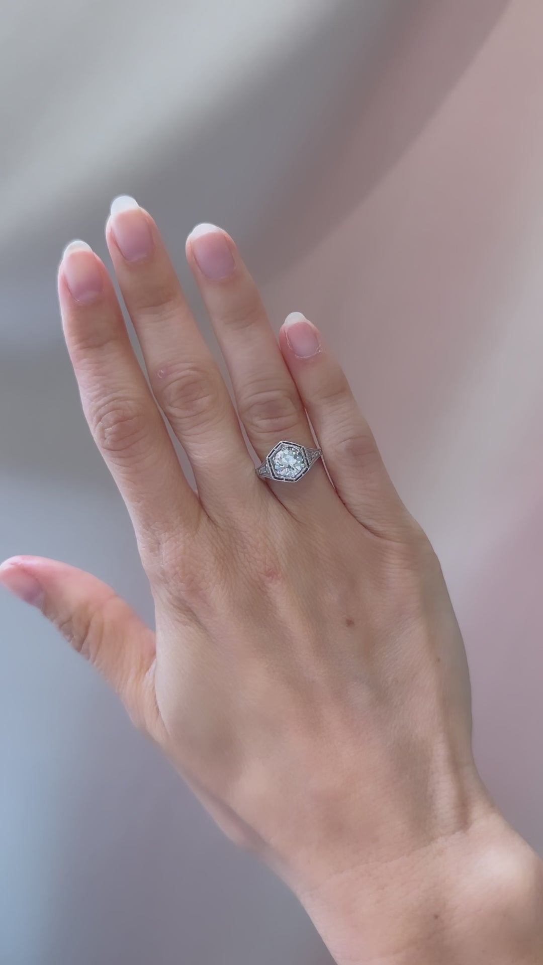 j-k-l color, vs clarity diamond in two-tone setting